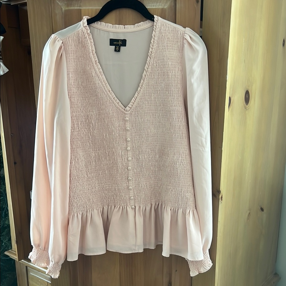 Elegant Pink Blouse with Ruffle Hem